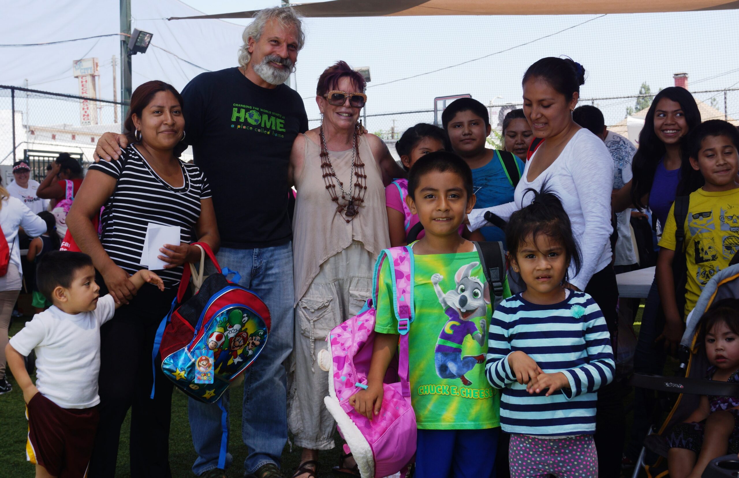CEO with students and parents outside