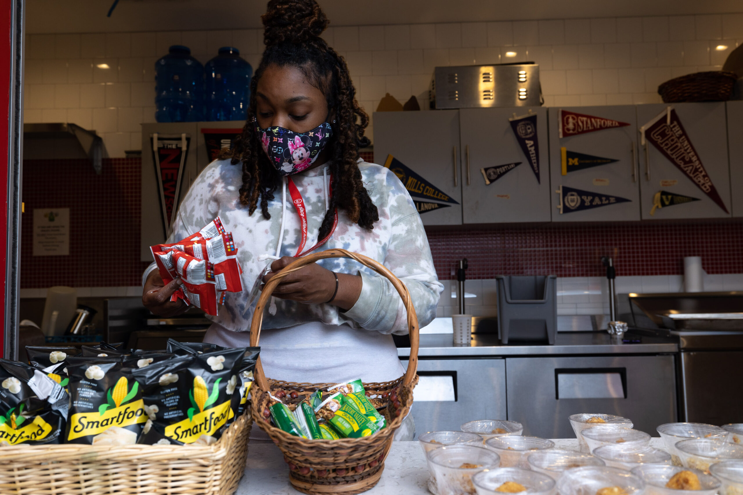 Sous Chef/Kitchen Assistant Tatiana stocks snacks for our members. Photo credit: Thomas Hammond (2022)