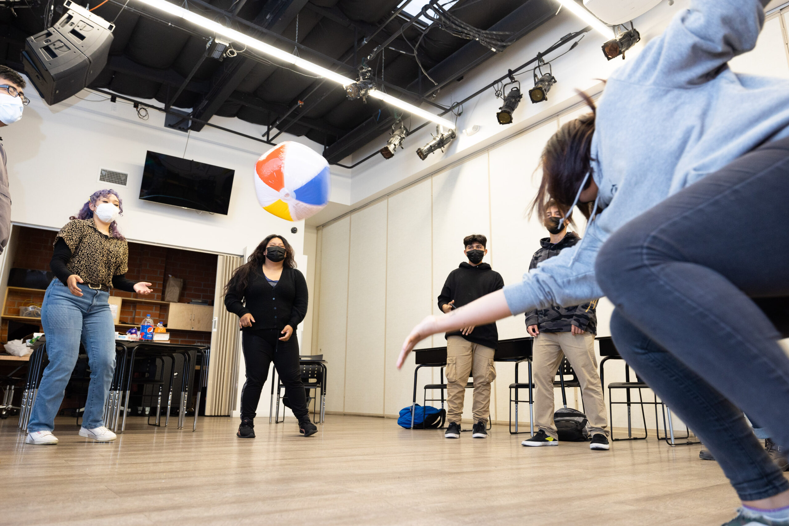 Photo of group playing keep it up indoors