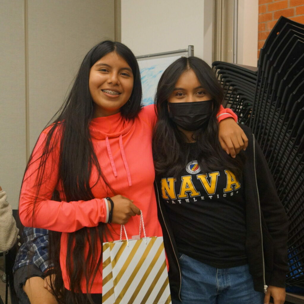 Two girls smiling