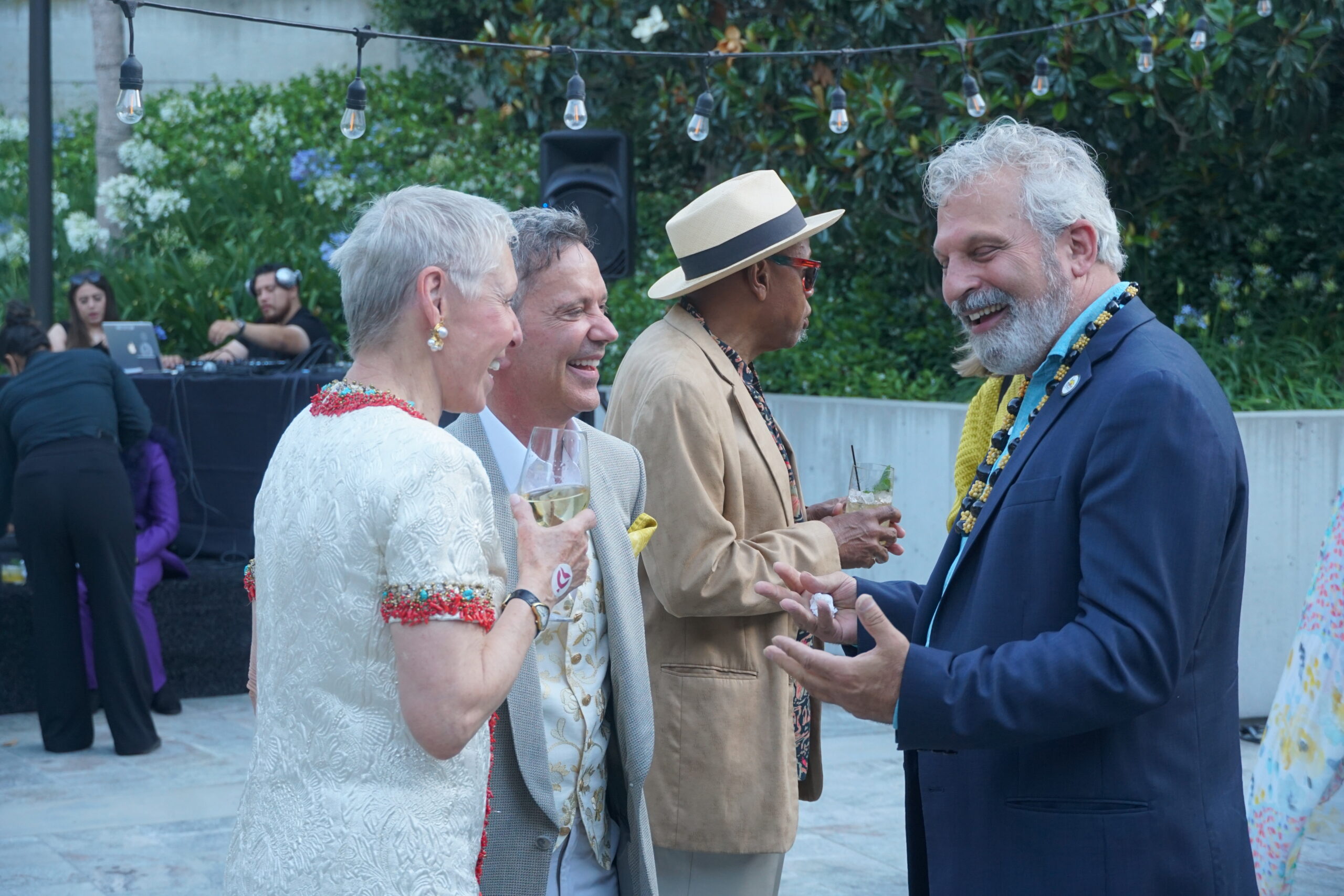Jonathan shares a laugh with longtime friends and supporters of A Place Called Home, David and Linda Shaheen