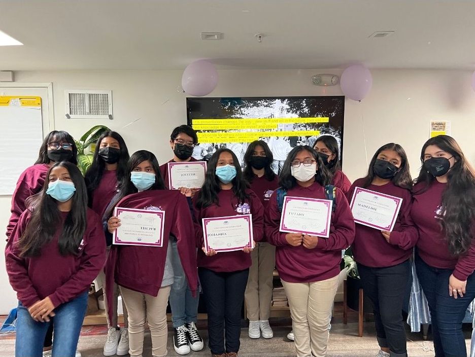Group of students with certificates