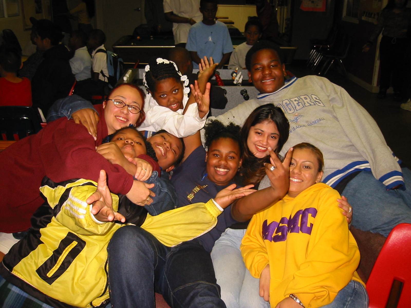 Group historical photo of students piled together