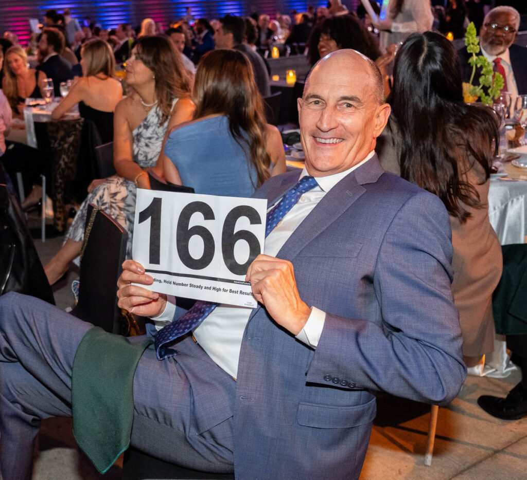 Tom with bid number